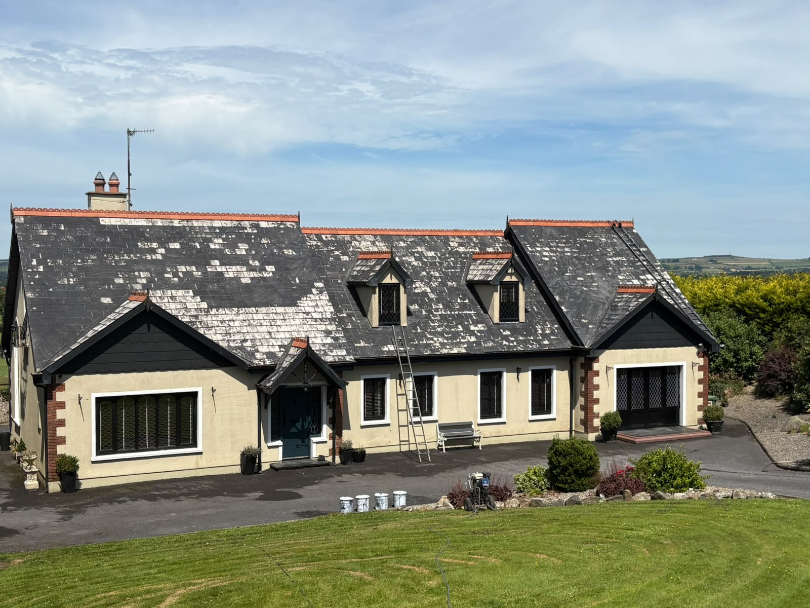 Waterford roof before painting - faded and weathered tiles
