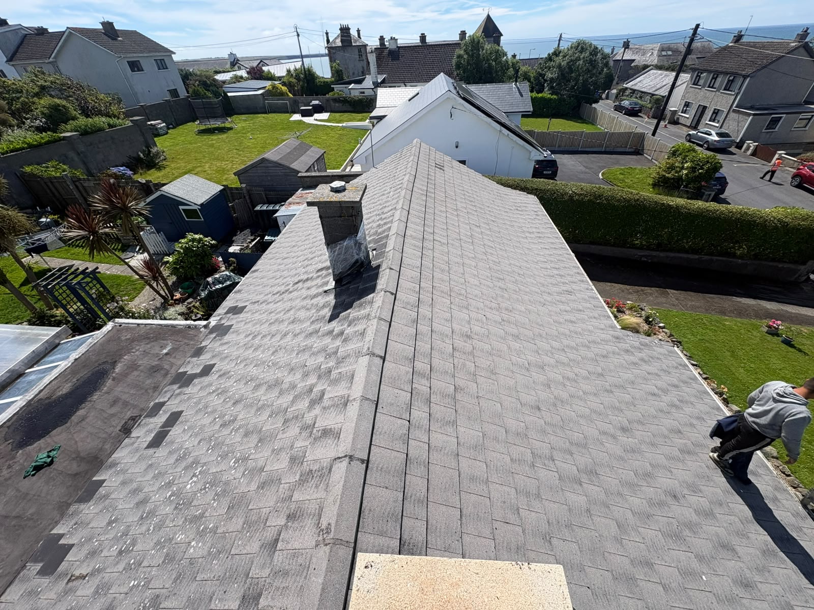 Weathered roof tiles before coating, Waterford home